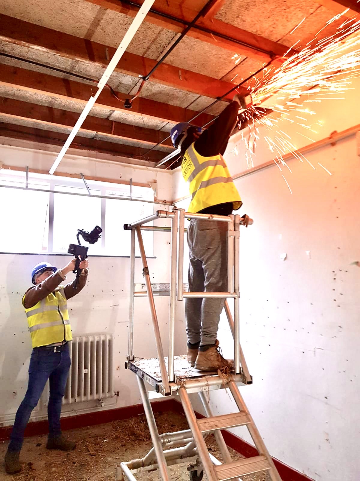 filming a construction worker